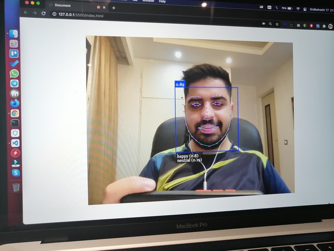 Mahdi Torkaman at his workstation, running a live face-detection demo